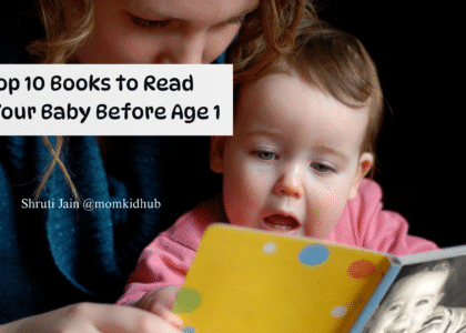 Mother reading a colorful board book to her baby while sitting on a bed, creating a cozy bedtime reading moment